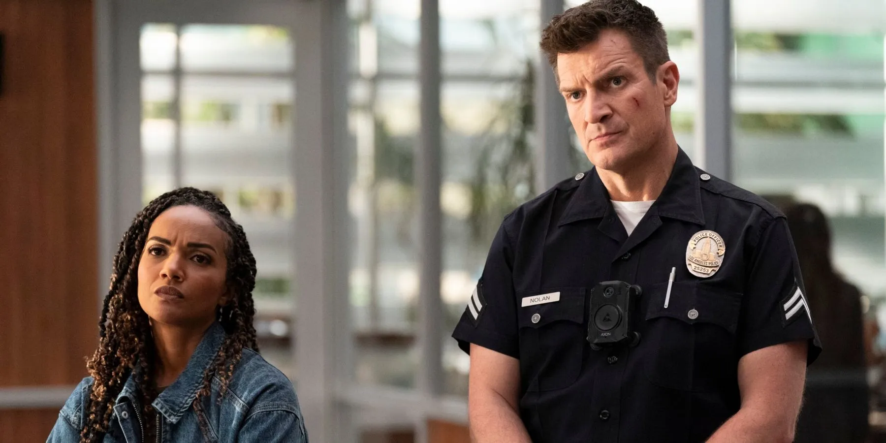 Nyla (Meika Cox) and Nolan (Nathan Fillion) on The Rookie Nyla (Meika Cox) and Nolan (Nathan Fillion) on The Rookie