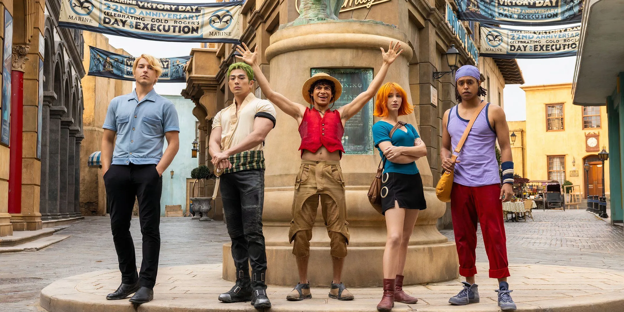 The Straw Hat Pirates looking cheerful on the Loguetown set from One Piece season 2 The Straw Hat Pirates looking cheerful on the Loguetown set from One Piece season 2