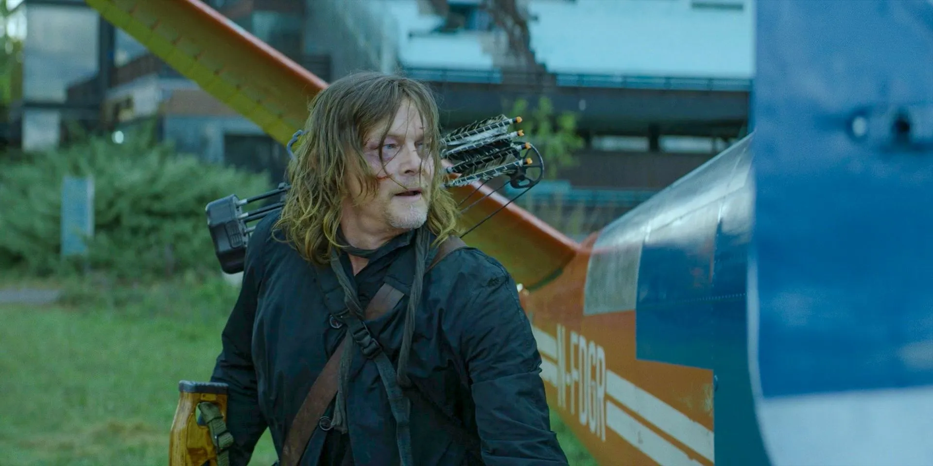 Daryl by the plane in The Walking Dead: Daryl Dixon.