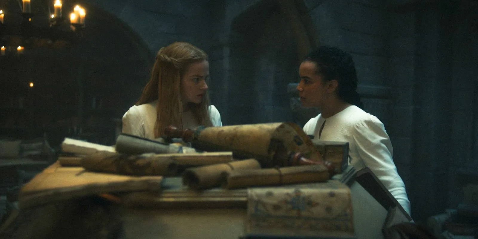 Elayne Trakand (Ceara Coveney) and Nynaeve al'Meara (Zoë Robins) in a library in The Wheel of Time Season 3 Ep 3 Elayne Trakand (Ceara Coveney) and Nynaeve al'Meara (Zoë Robins) in a library in The Wheel of Time Season 3 Ep 3