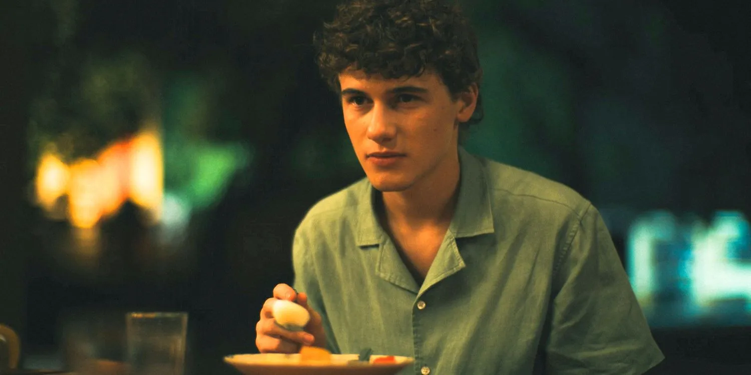 Lochlan having dinner at the monastery in The White Lotus Season 3 Ep 7