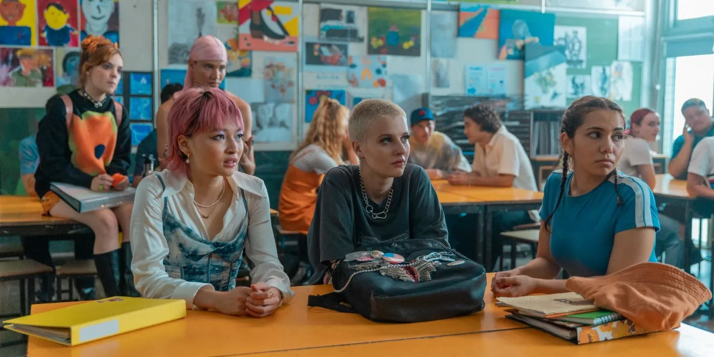 Students sitting at a table in Heartbreak High.