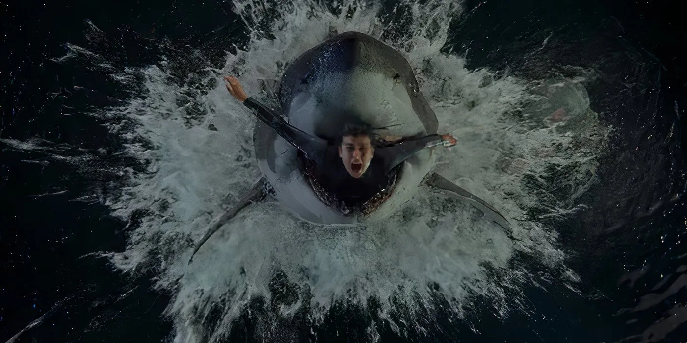 A shark bursting out of the water to eat Mika in Under Paris