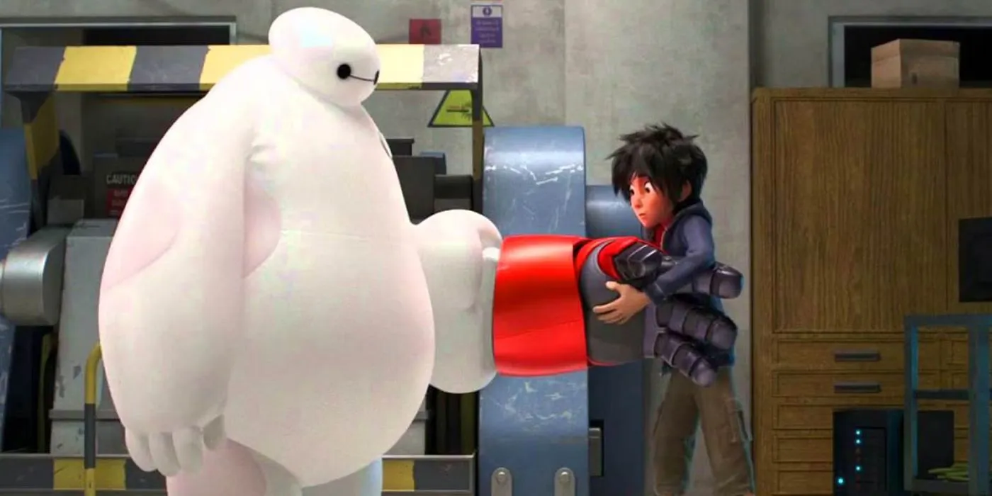Hiro helping Baymax with a glove in Big Hero 6