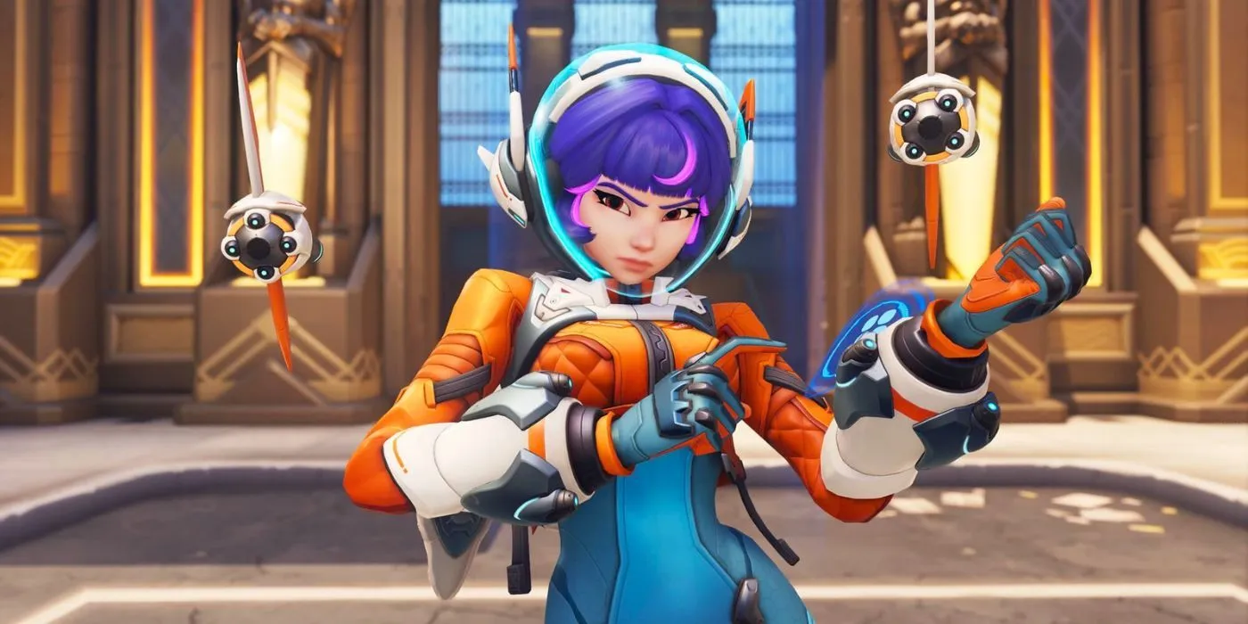Juno posing with two droids in Overwatch 2