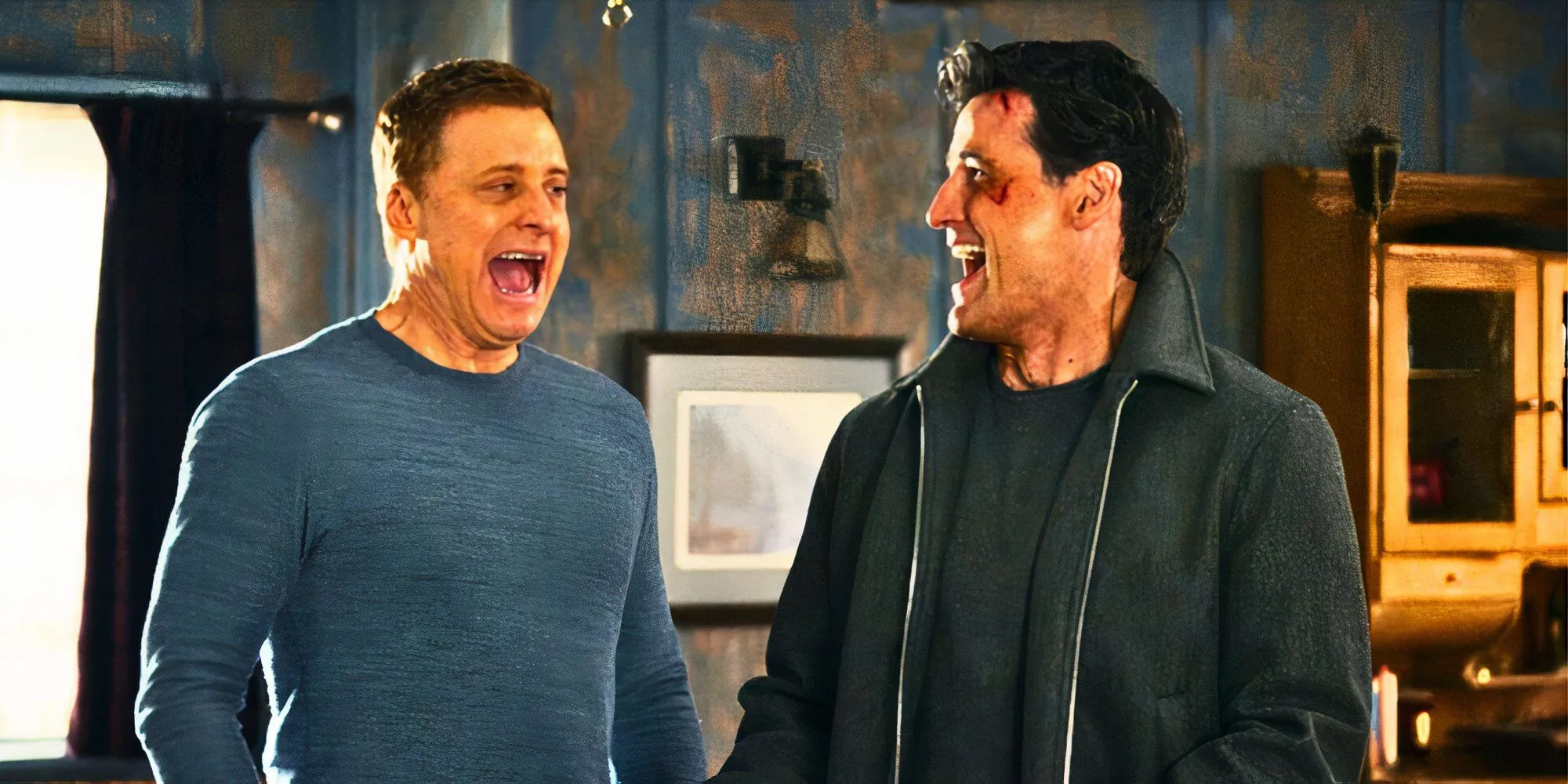 Harry and Joseph laughing together in Resident Alien