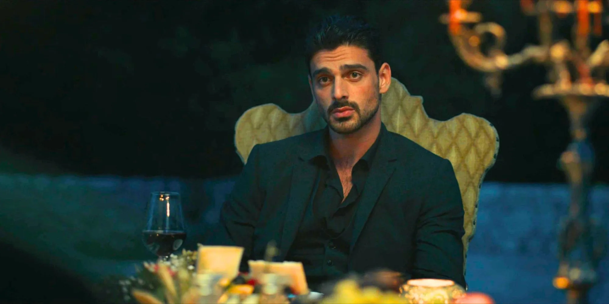Michele Morrone at a dinner scene in 365 Days Michele Morrone at a dinner scene in 365 Days