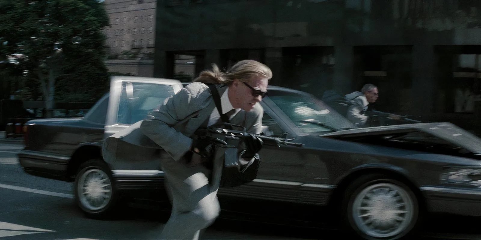 Val Kilmer during a shootout in Heat Val Kilmer during a shootout in Heat