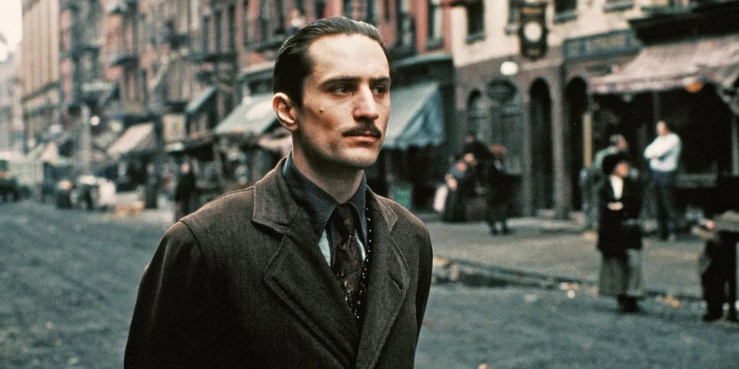 Vito Corleone (Robert De Niro) arrives in America after escaping his family's enemies in The Godfather Part 2 Vito Corleone (Robert De Niro) arrives in America after escaping his family's enemies in The Godfather Part 2