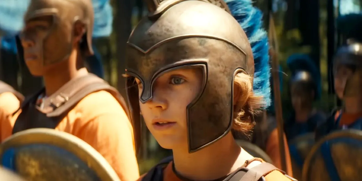 Walker Scobell as Percy Jackson in a helmet at Camp Half-Blood Walker Scobell as Percy Jackson in a helmet at Camp Half-Blood