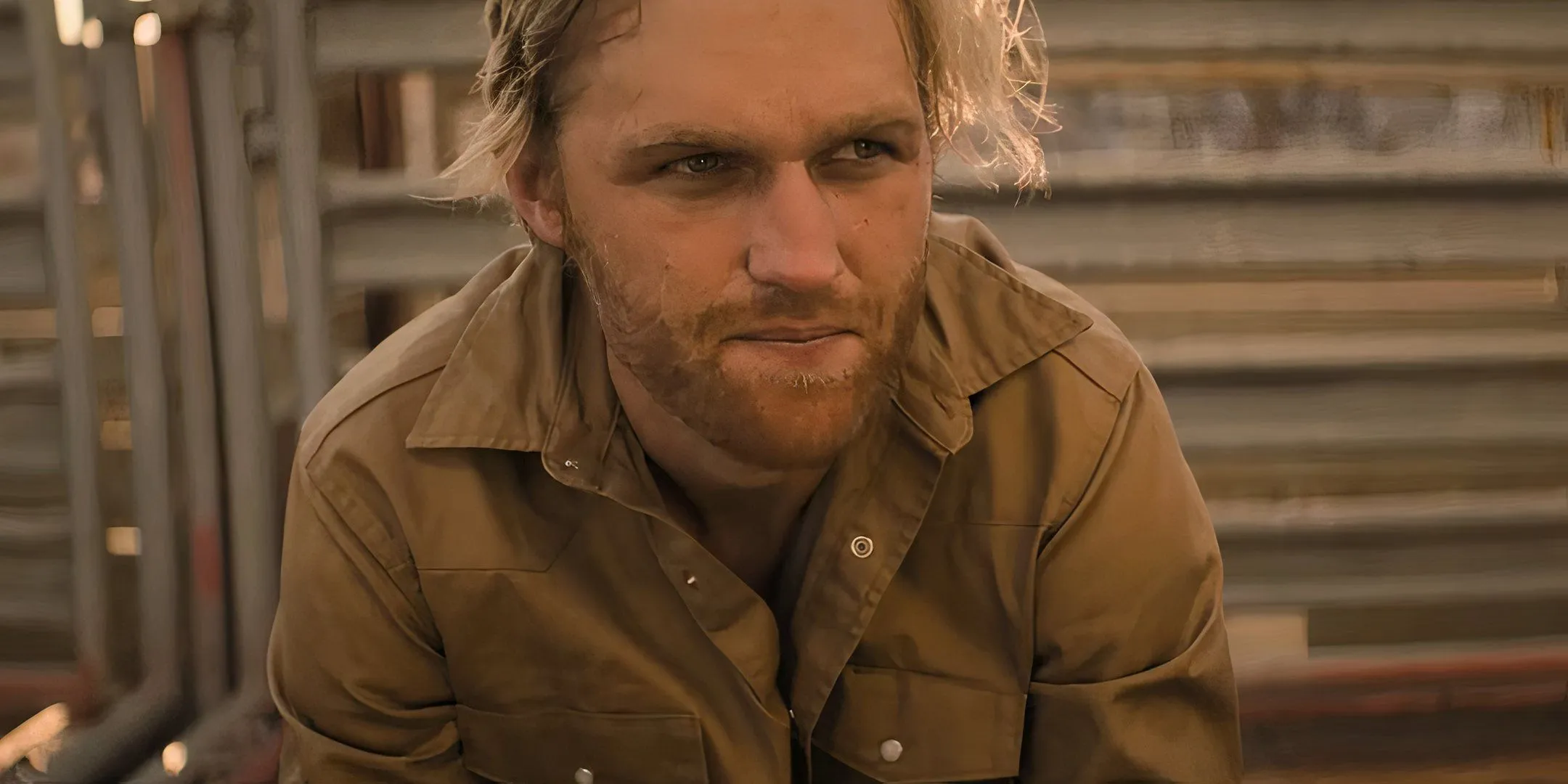 Wyatt Russell as True looking tired in a horse stall Wyatt Russell as True looking tired in a horse stall