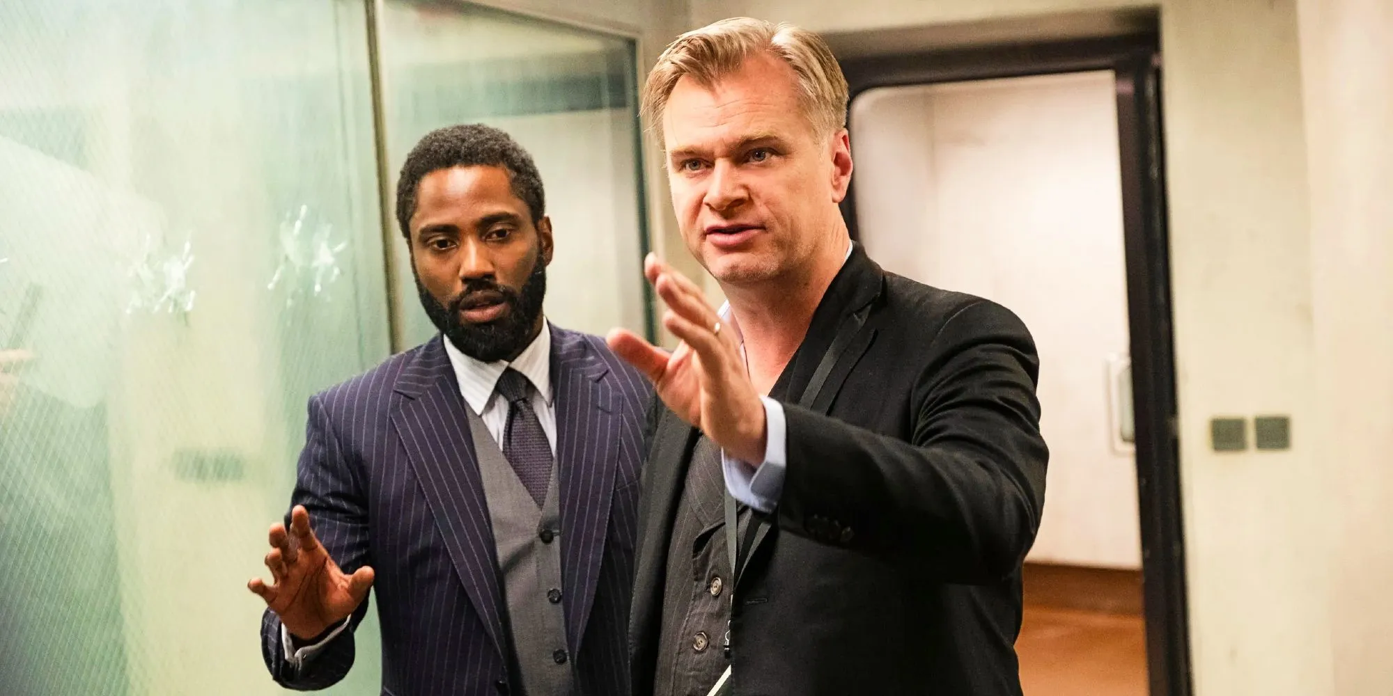 Christopher Nolan directs John David Washington on the set of Tenet