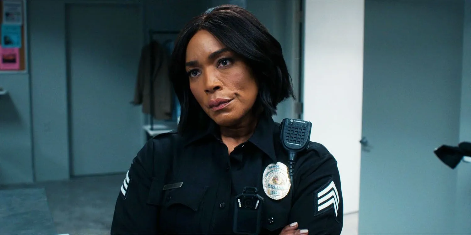 Athena in 9-1-1 season 8, episode 17, looking at a suspect Athena in 9-1-1 season 8, episode 17, looking at a suspect