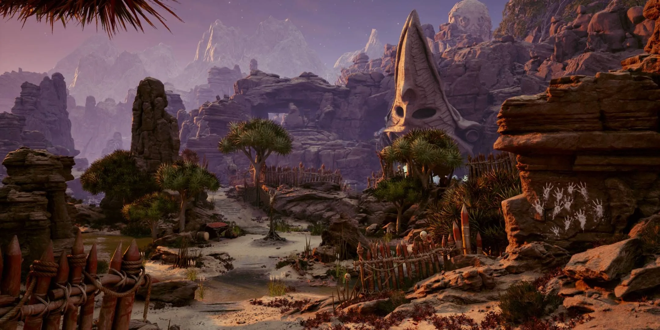 An open expanse with tribal buildings in Avowed. An open expanse with tribal buildings in Avowed.