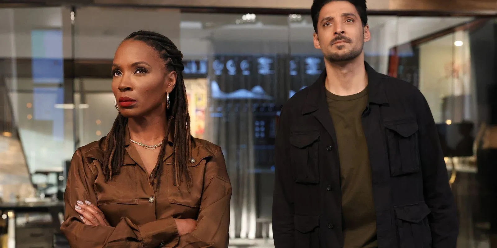 Shanola Hampton as Gabi Mosely alongside Karan Oberoi as Dhan Rana in Found Shanola Hampton as Gabi Mosely alongside Karan Oberoi as Dhan Rana in Found