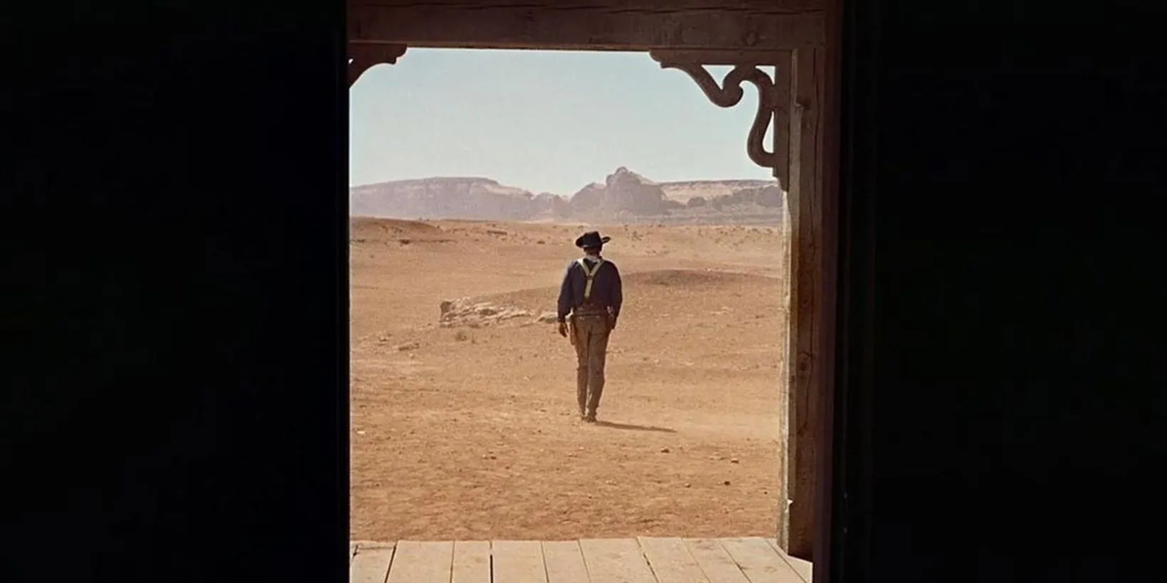 John Wayne leaving in The Searchers John Wayne leaving in The Searchers