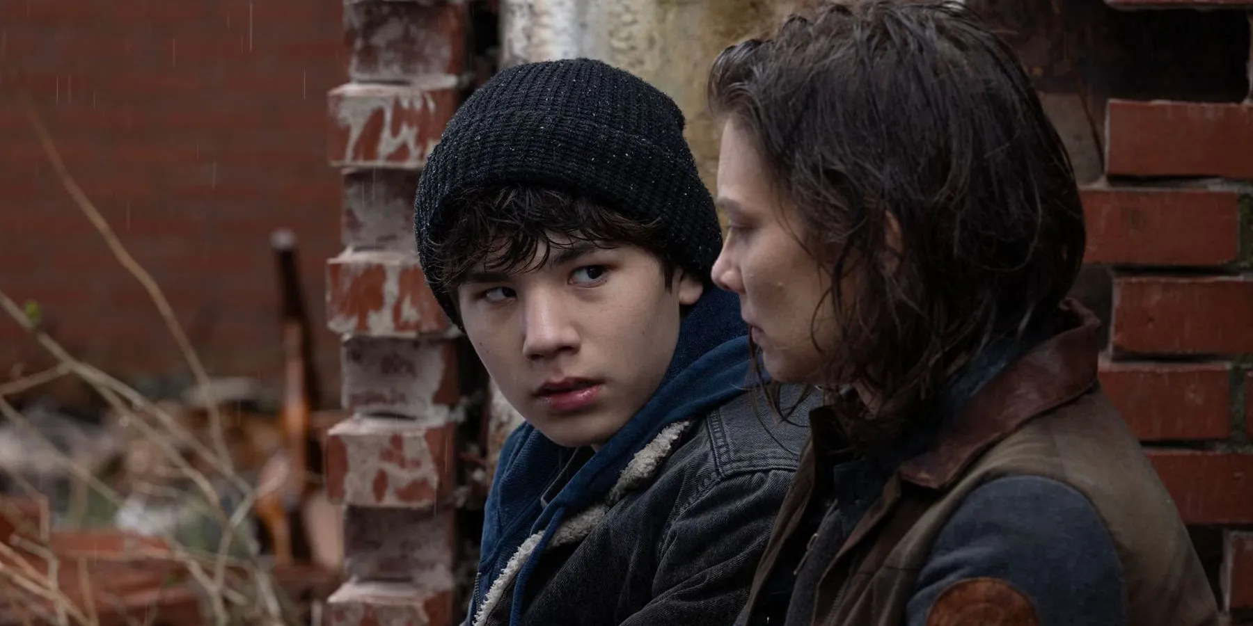 Hershel looks at Maggie with a guilty expression