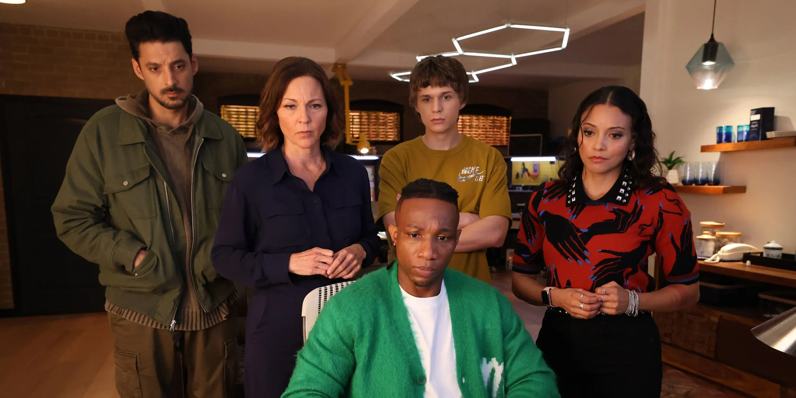 A group of Found characters examining an object in season 2 A group of Found characters examining an object in season 2