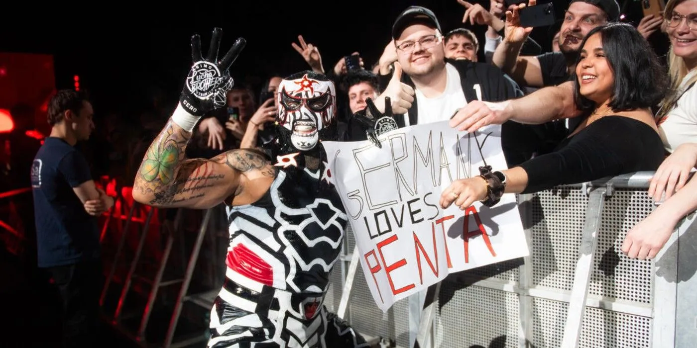 Penta holds up a sign at a WWE house show in Germany Penta holds up a sign at a WWE house show in Germany