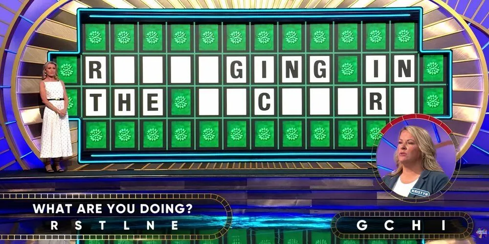 Rummaging in the backyard puzzle from Wheel of Fortune with Vanna White standing by
