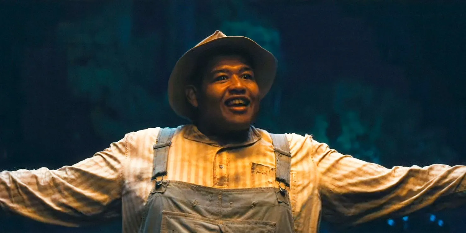 Omar Benson Miller as Cornbread smiling in Sinners Omar Benson Miller as Cornbread smiling in Sinners