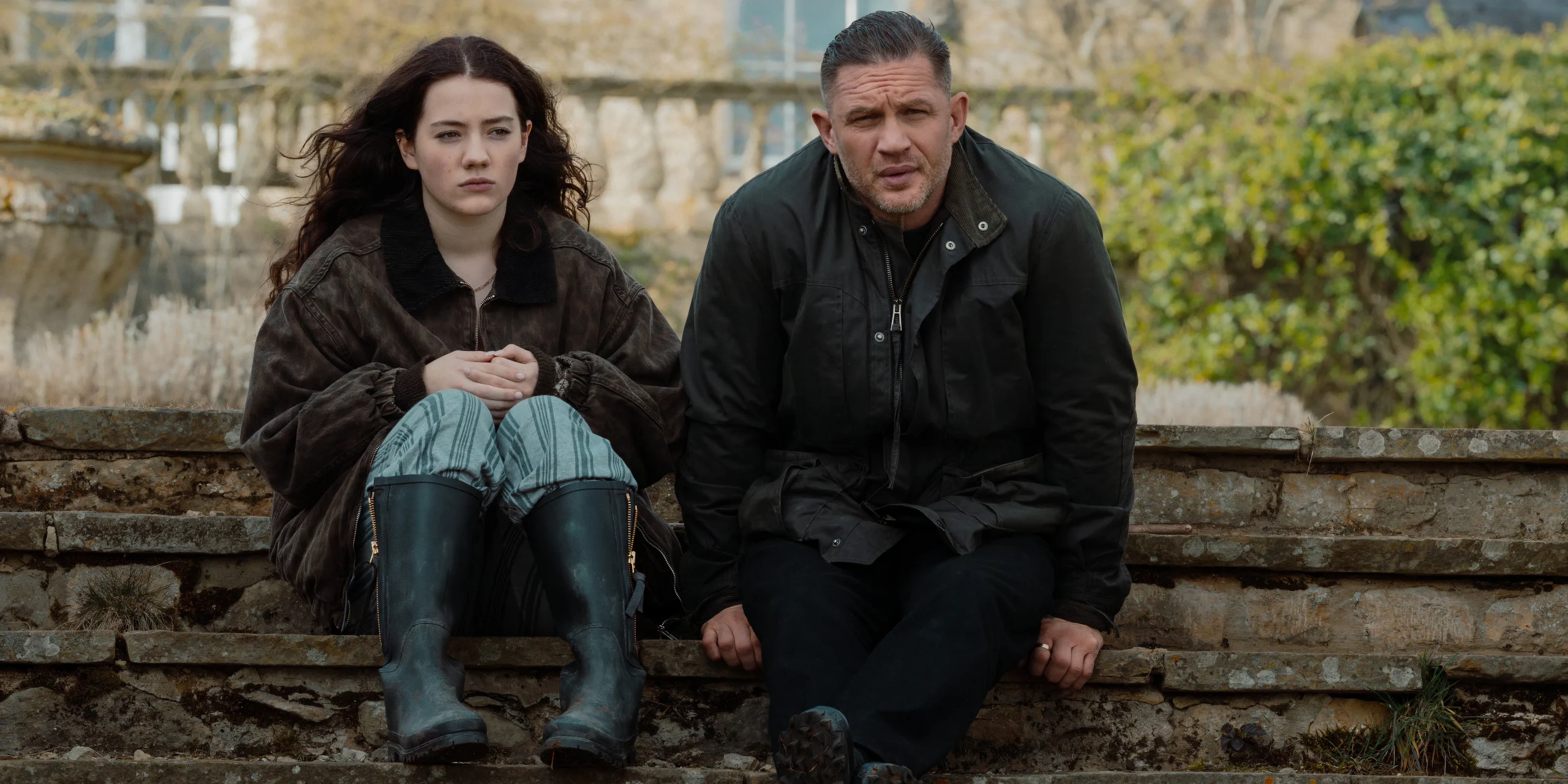 Teddie Allen and Tom Hardy sit on steps in MobLand episode 8 Teddie Allen and Tom Hardy sit on steps in MobLand episode 8