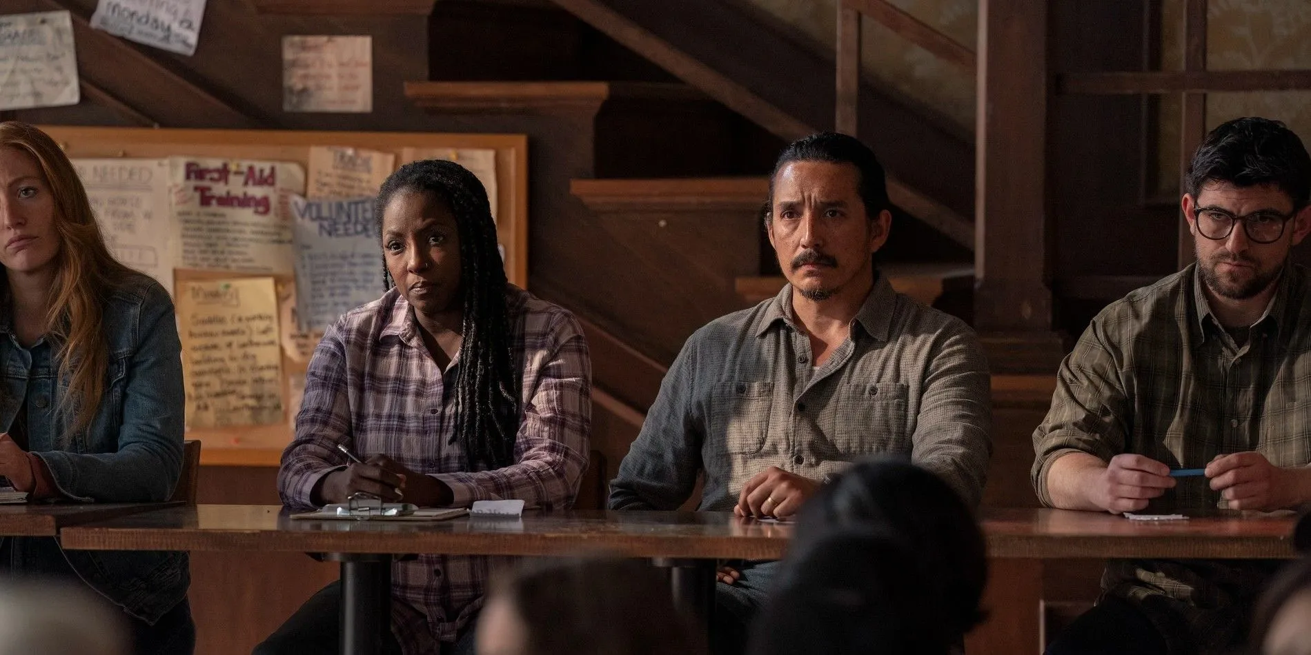 Tommy and Maria in a council meeting in The Last of Us Tommy and Maria in a council meeting in The Last of Us