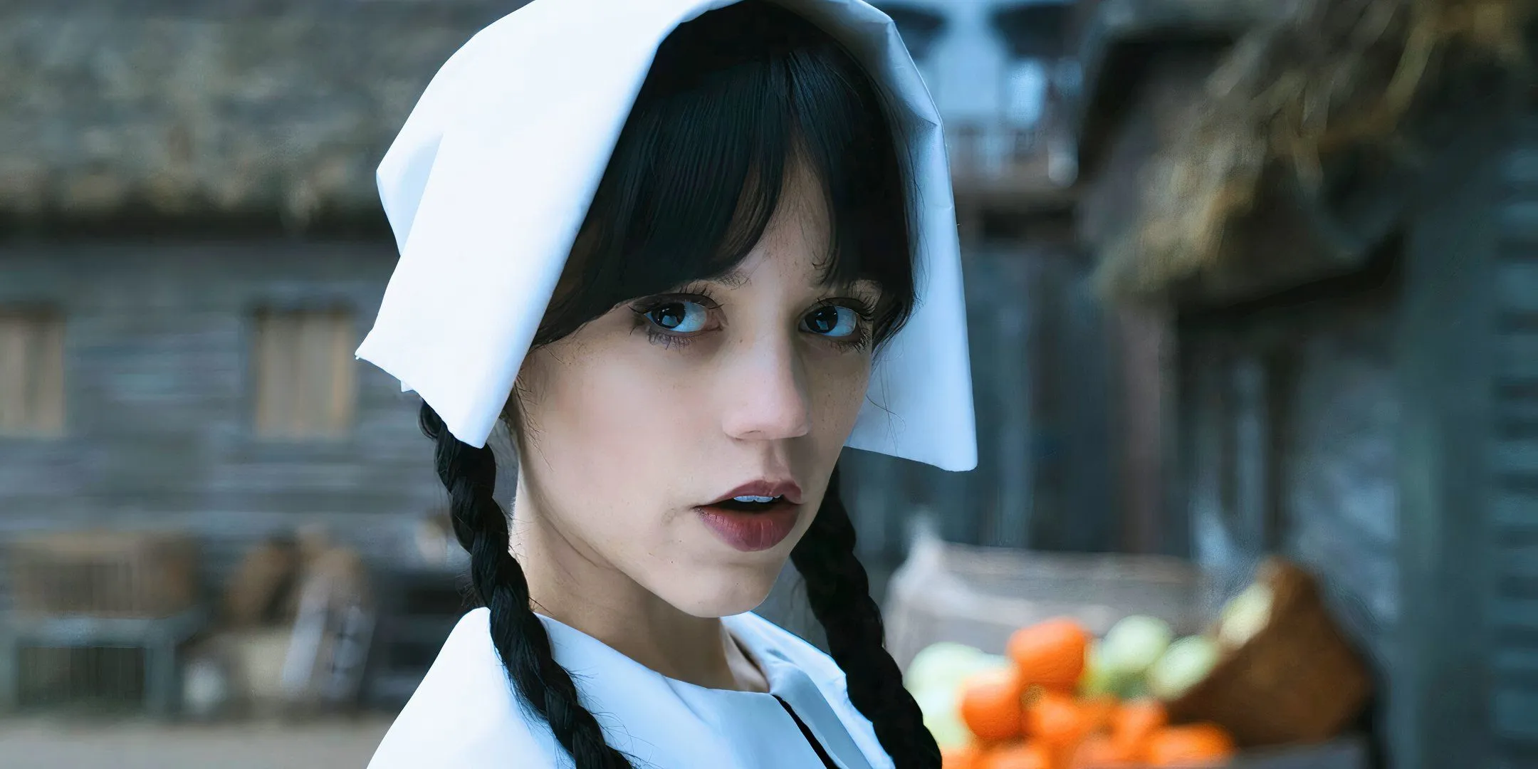 Jenna Ortega as Wednesday close up in pilgrim attire