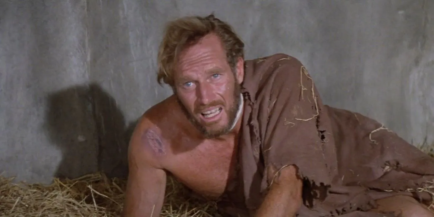 Charlton Heston as George Taylor in prison in Planet of the Apes (1968) Charlton Heston as George Taylor in prison in Planet of the Apes (1968)