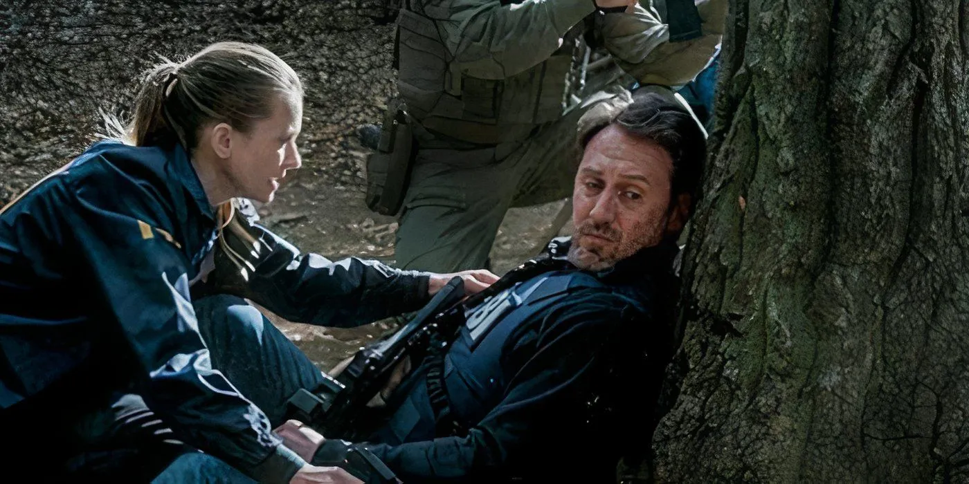 Will (Josh Stewart) leaning against a tree in Criminal Minds Evolution