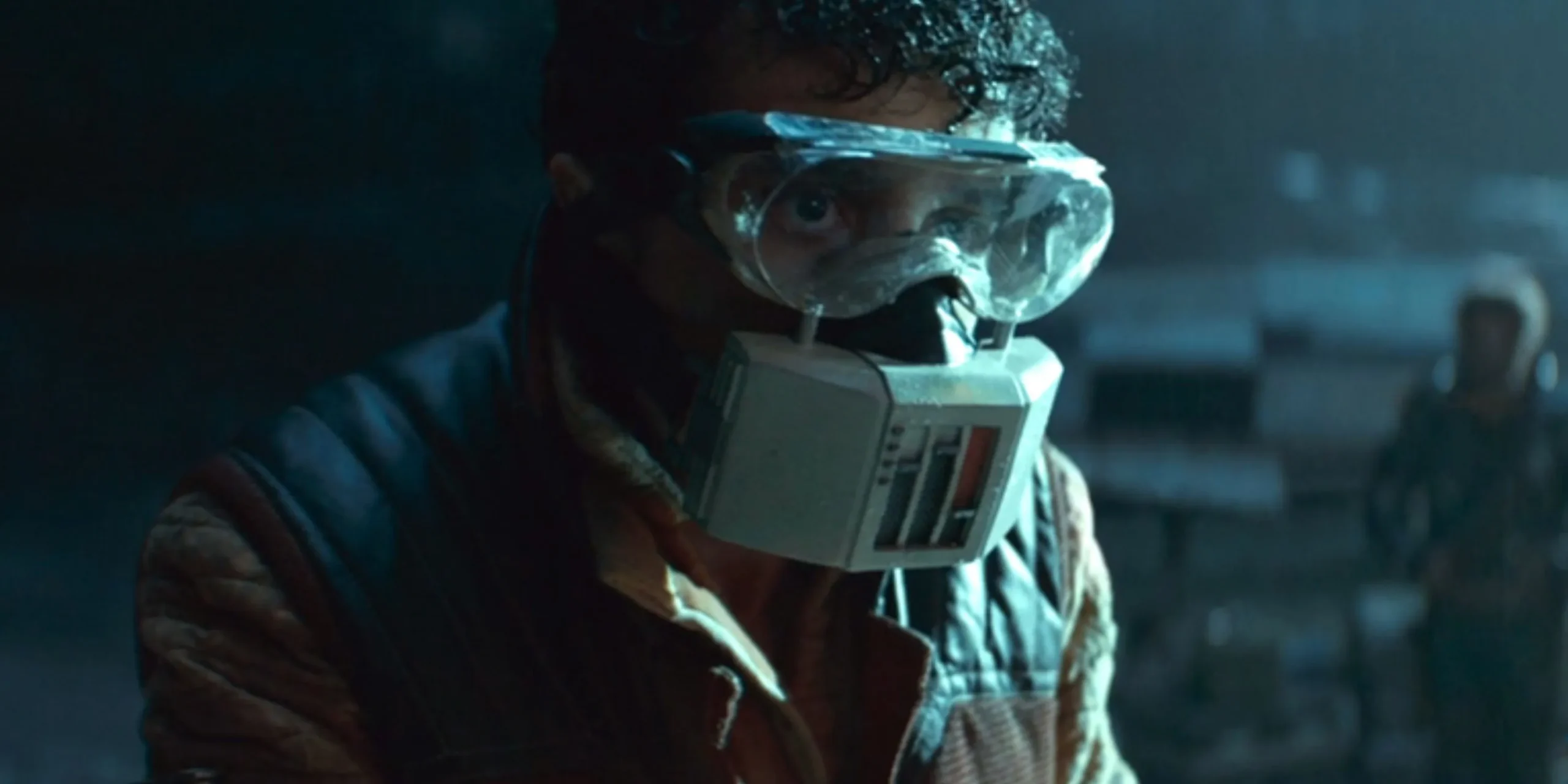 Wilmon Paak wearing a mask in Andor